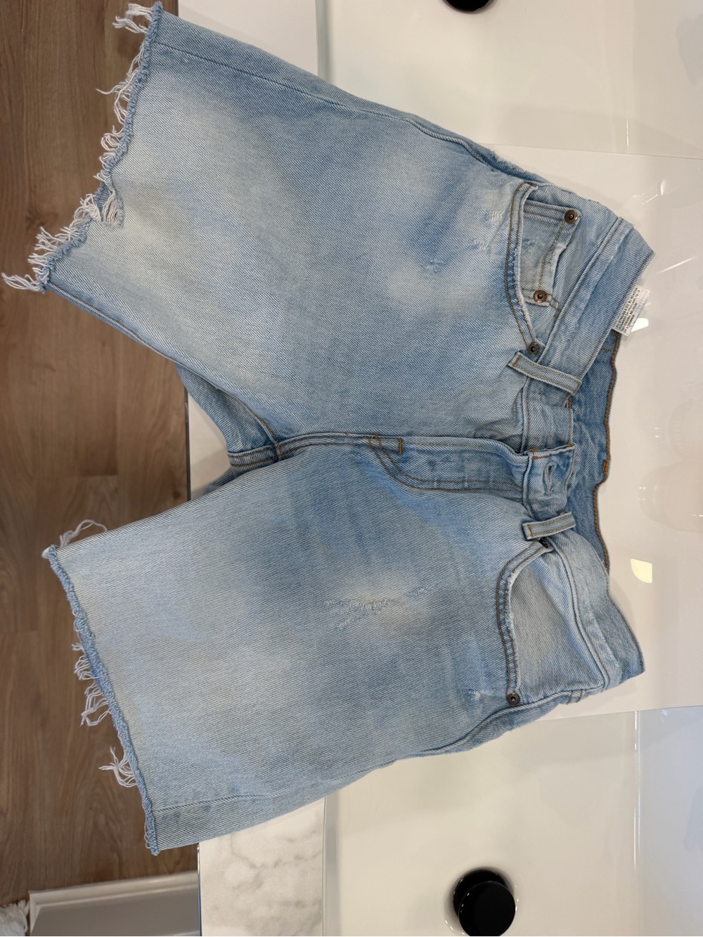 Levi’s 501 Light Wash Distressed Denim Cutoff Shorts